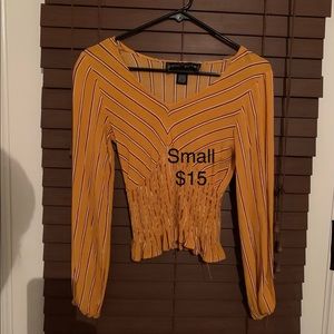 Macy’s unworn yellow top